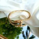 golden nail bracelet