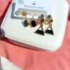 Black and gold earrings