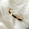 Sleek Bracelet with Black Accent